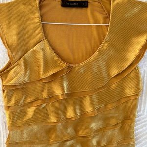The limited yellow/gold blouse